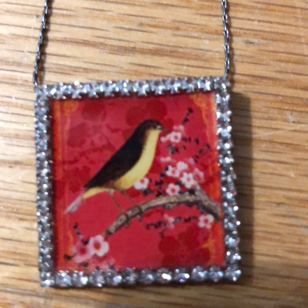 Bird necklace with cherry blossoms